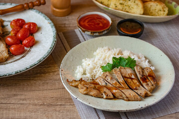 Grilled pork served on top of steamed rice