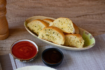 Slices of toasted bread with garlic and herbs