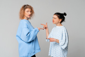 Mother daughter conflict. Argument between annoyed teen daughter and upset middle aged mother. Bad,...