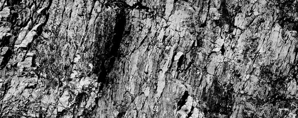 Grungy cragged bumpy pitted cavity stone facade, split layer gap.Ruined cracked shattered worn rough hiking canyon.Old ragged grunge steep marble cliff. Grand vintage crannied damaged impressive gorge