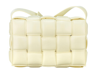 Magnificent bag made of cream-colored braided leather, with a strap-harness for carrying on the shoulder, isolated on a white background. Front view. Expensive women's accessories.