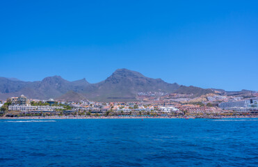 Fototapeta na wymiar Panoramic view of the Costa de Adeje from a boat in the south of Tenerife, Canary Islands