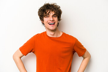 Young caucasian man isolated on white background confident keeping hands on hips.