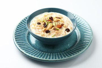 Khir or kheer payasam also known as Sheer Khurma Seviyan consumed especially on Eid or any other festival in india/asia. Served with dry fruits toppings selective focus 