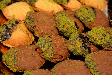 A pile of traditional Arabic cookies for celebration of Islamic holidays of El-Fitr feast, petit...