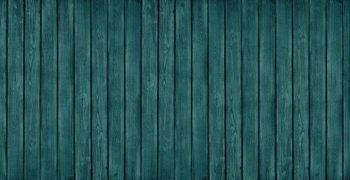 Dark teal painted shabby wooden board wide texture. Wood plank widescreen wallpaper. Large abstract rustic background