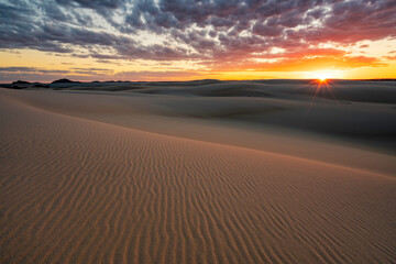 Fototapeta na wymiar Sunset Over Dark Point Sand Dunes, Myall Lakes National Park, Hawks Nest, NSW, Australia 