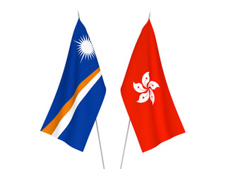 National fabric flags of Hong Kong and Republic of the Marshall Islands isolated on white background. 3d rendering illustration.