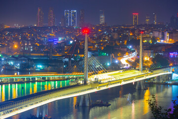 Golden Horn bridge and night view of Istanbul
