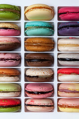 Multi-colored macarons or macaroons, close-up. Design element. Top view, selective focus