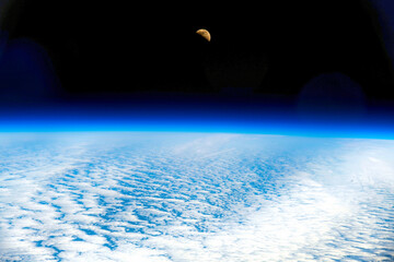 The moon and the atmosphere. Digital Enhancement. Elements By NASA