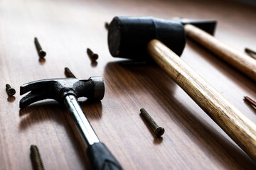  Some tools, a set of hammers with some nails and screws

