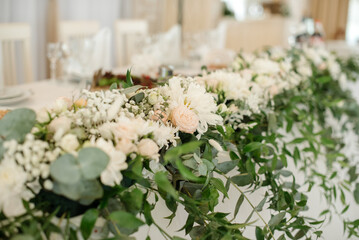 Obraz na płótnie Canvas Stylish decorated wedding tables with flowers