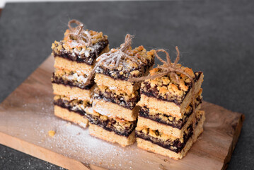 Viennese biscuits with currants are neatly folded and tied with string. Horizontal photo.