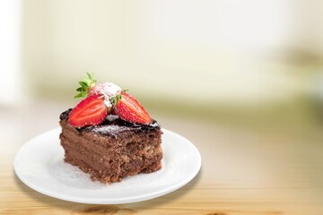 Square brownie chocolate one slice on white plate.