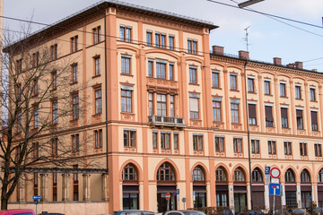 Naklejka premium Munich, Germany - December 19 2021: Street view of the facade of the building in Munich downtown on Winter day.