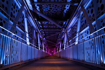 the view inside the illuminated pedestrian bridge in Abu Dhabi UAE