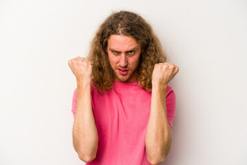 Young caucasian man isolated on white background upset screaming with tense hands.