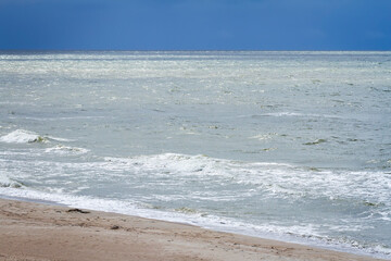 Sand beach and waves