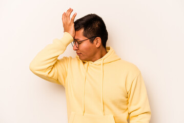 Young hispanic man isolated on white background forgetting something, slapping forehead with palm and closing eyes.