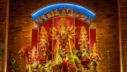 Goddess Durga idol at Durga Puja pandal in Kolkata, West Bengal, India. Durga Puja is one of the...