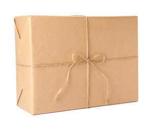 Parcel wrapped with kraft paper and twine isolated on white