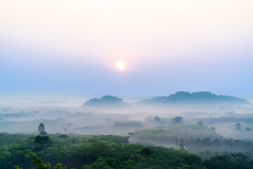 Obraz premium Morning sunrise above the landscape of rural area of Surat Thani province in Thailand