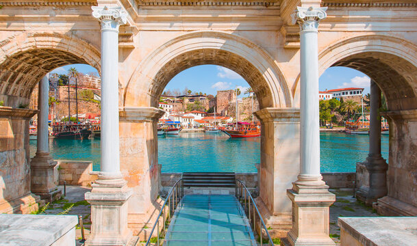 View of Hadrian's Gate, old city of Antalya in the background - Antalya,  Turkey