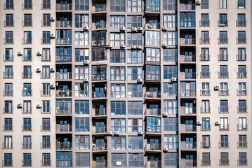 The facade of a multi-stored apartment building.