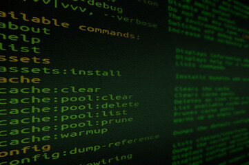 Source code on screen close-up with selective focus. Internet security breach