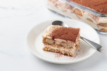 Piece of Homemade Tiramisu cake dessert