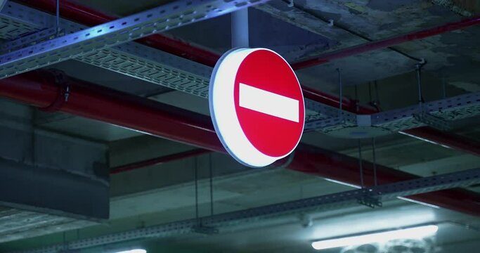 illuminated traffic sign prohibiting movement in the direction of the garage