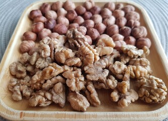 Walnuts and hazelnuts on a plate
