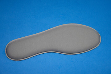  gray Memory Foam  Shoe Insoles on blue  background