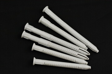 big gray Plastic Dowels isolated