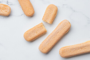 Italian cookie savoiardi. Sweet biscuits. Sponge cookies tiramisu on white background