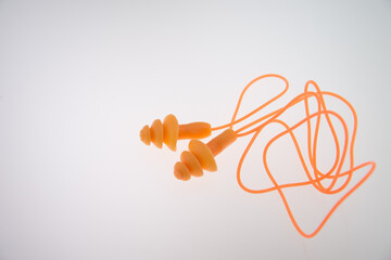 orange Foam ear plugs isolated