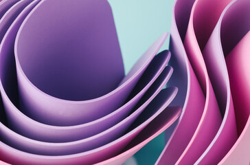 Dynamic motion abstract elements with pink and periwinkle sheets on a sunny teal background....