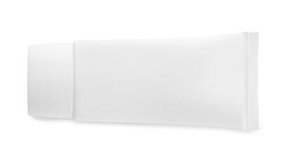 Blank tube of cosmetic product on white background, top view