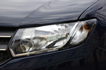 Car's exterior details.Blue car - headlight on a blue  car