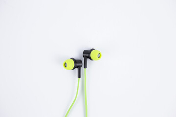 audio music headphones light green color on a white background