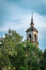 Fototapeta na wymiar the bell tower of an abandoned Orthodox church