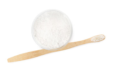 Bowl of tooth powder and brush on white background, top view