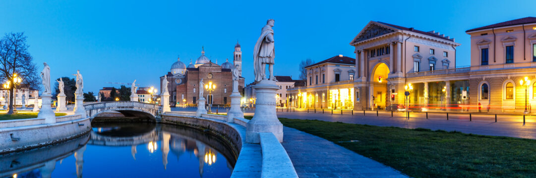 Padua Prato Della Valle square with statues travel traveling holidays vacation town panorama at night in Padova, Italy