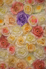 Obraz na płótnie Canvas layer of artificial roses at the wedding
