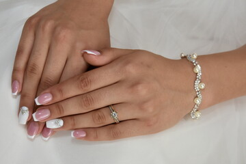 the bride shows her wedding ring