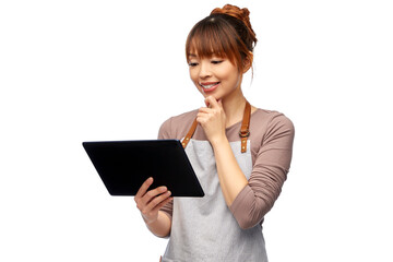cooking, technology and people concept - happy smiling female chef or waitress in apron with tablet pc computer over white background