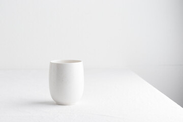 White teacup on a table