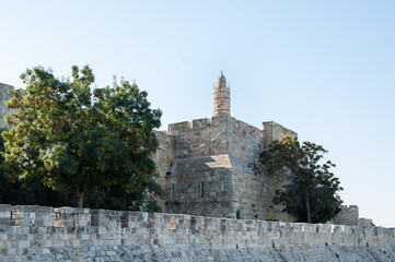 View of the landmark, stone Tower of David and the surrounding walls and greenery of the Old City of Jerusalem. © Yehoshua Halevi