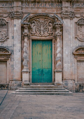Fototapeta na wymiar Entrance door of the Church of Santa Lucia alla Badia
